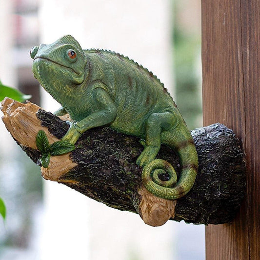 Resin chameleon figurine on the tree